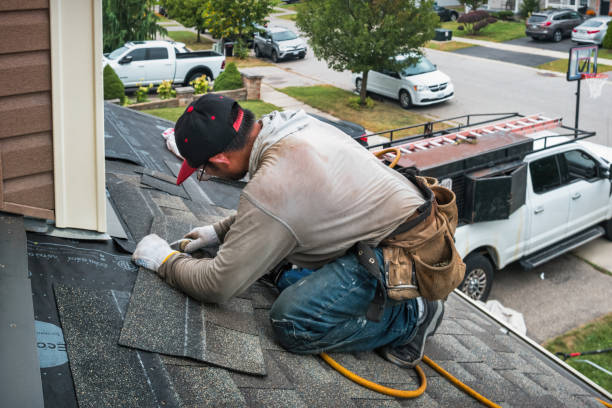 Professional Emergency Roof Repair technician working in Stoughton, MA